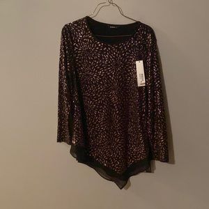 Blouse purchased as gift in England. Beautiful detailing.